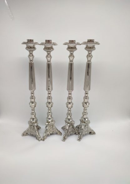 Candelabros plateados sagrada familia